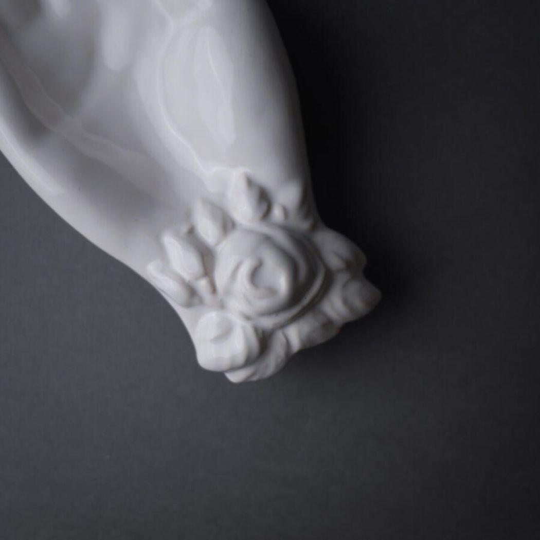 Hvide Porcelænshænder