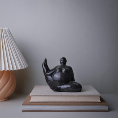 Sort Buttet Kvindefigur