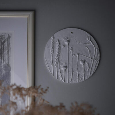 Rundt Relief med Blomster