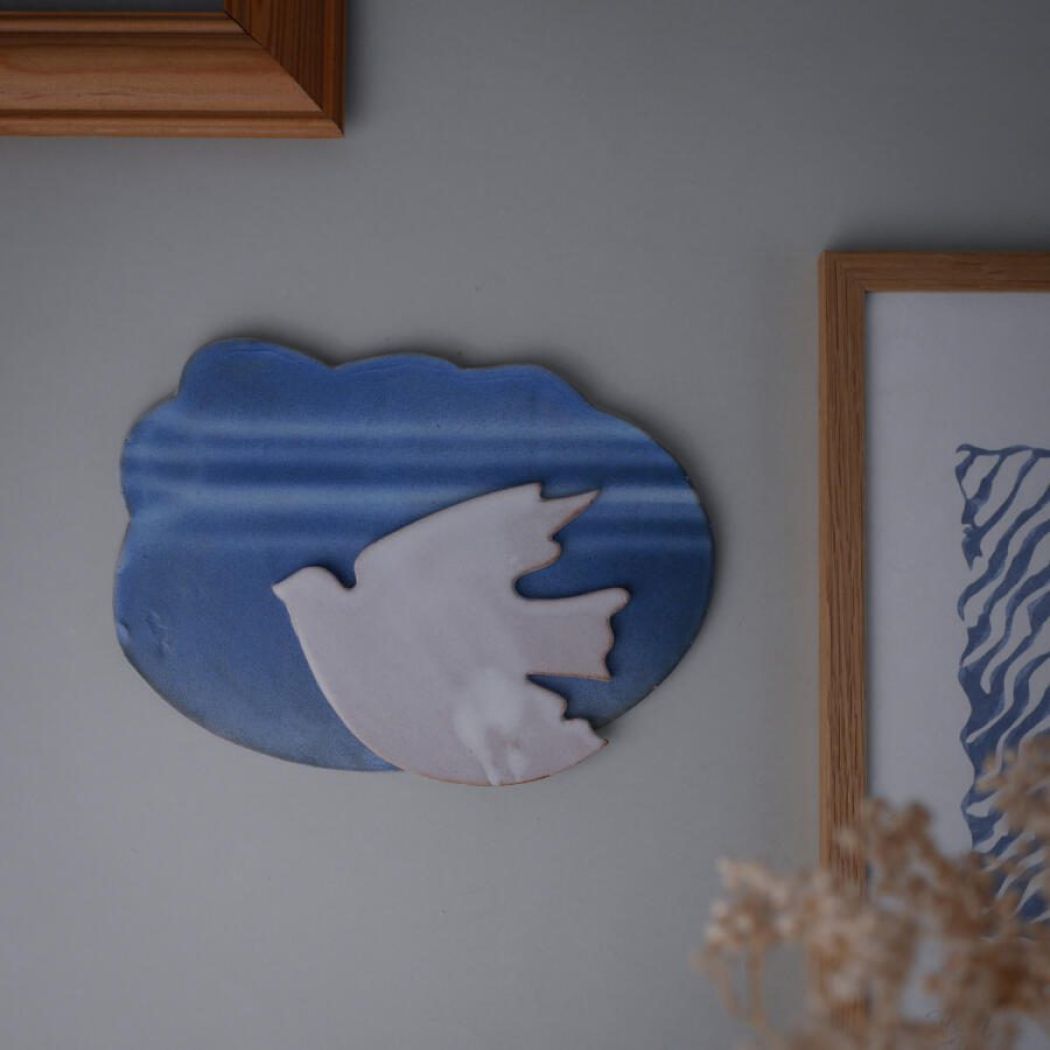 Blåt Sky Relief med Due